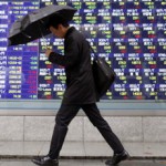 Asian shares rise as weak China data spurs stimulus bets