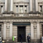 BOJ maintains policy, offers bleaker view on exports