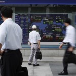 Asian shares edge higher after Fed vote, China, Greece eyed