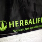 Herbalife cuts sales outlook, shares drop to 10.5 percent