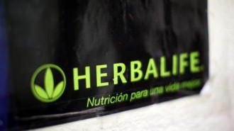 A Herbalife logo is shown on a poster at a clinic in the Mission District in San Francisco
