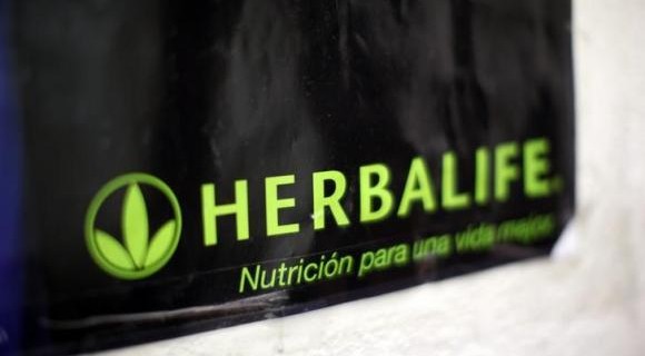 A Herbalife logo is shown on a poster at a clinic in the Mission District in San Francisco