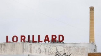 corporate sign is seen atop their cigarette manufacturing plant in Greensboro, North Carolina