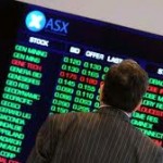 Australian dollar unexpectedly falls to four-year low; local market posts first modest gain in over a week