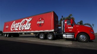 Coca-Cola truck fills up with diesel fuel at a gas station in Carlsbad California