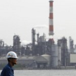 Japan government turns more cautious on weak factory output