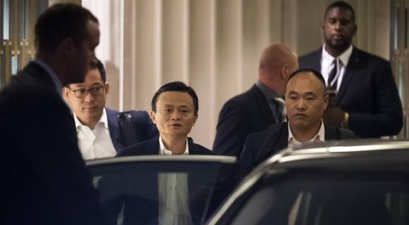 Ma, the founder and executive chairman of Alibaba Group Holding, leaves following the company's roadshow meeting in New York