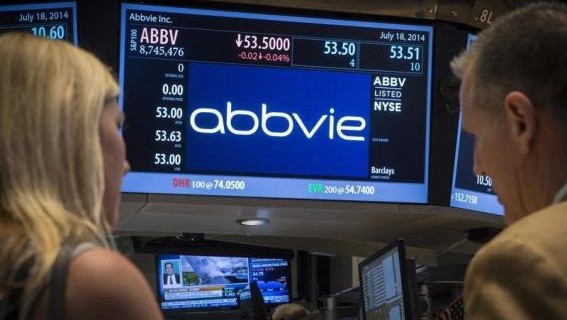 A screen displays the share price for pharmaceutical maker AbbVie on the floor of the New York Stock Exchange