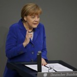 Merkel urges EU to keep up reforms as crisis not over