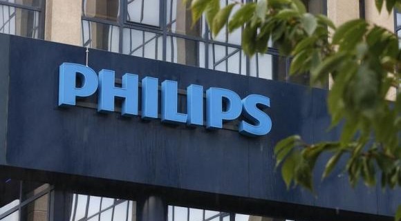 Philips is seen at the company's entrance in Brussels