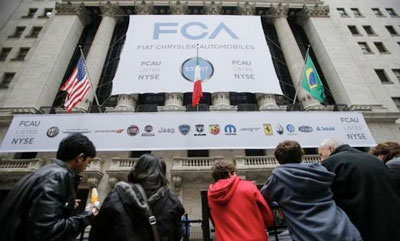 People wait for the arrival of Sergio Marchionne, chief executive officer of Fiat Chrysler Automobiles (FCA)