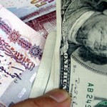 Egyptian pound steady at forex auction, dips on black market