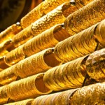 PRECIOUS-Gold stays firm after Fed raises rates