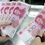Most Asian currencies inch up