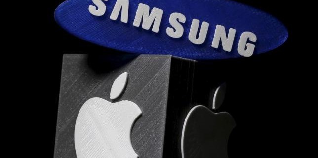 3D-printed Samsung and Apple logos are seen in this picture illustration made in Zenica