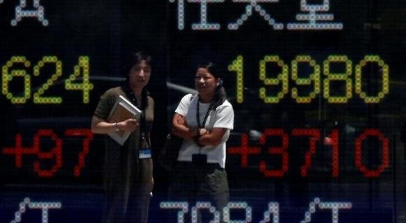 Share price of Japan's Nintendo Co. is displayed at a stock quotation board outside a brokerage in Tokyo, Japan