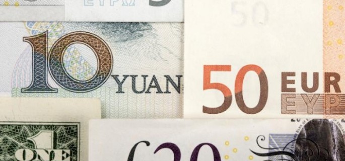 Arrangement of various world currencies including Chinese Yuan, US Dollar, Euro, British Pound