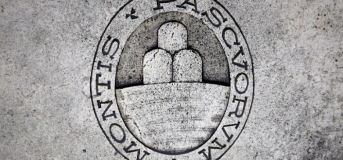 A logo of Monte dei Paschi di Siena bank is seen on the ground in Siena