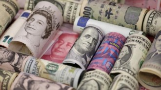 Euro, Hong Kong dollar, U.S. dollar, Japanese yen, British pound and Chinese 100-yuan banknotes are seen in a picture illustration