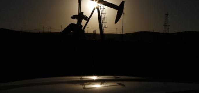 A pump jack is seen at sunrise near Bakersfield