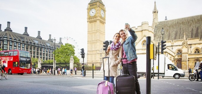 Young tourist couple shoots selfie Big Ben London UK