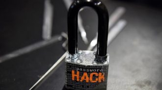 A padlock is displayed at the Alert Logic booth during the 2016 Black Hat cyber-security conference in Las Vegas