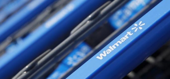 Shopping carts are seen outside a new Wal-Mart Express store in Chicago