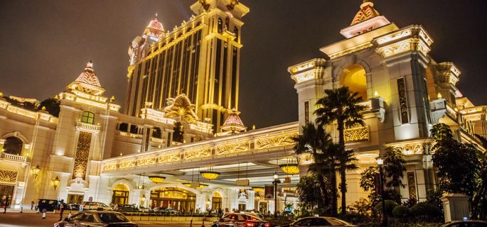 Taxis sit parked in front of the Galaxy Macau casino and hotel in Macau, China