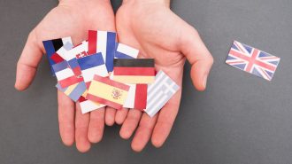 European flags and great britain flag on hands